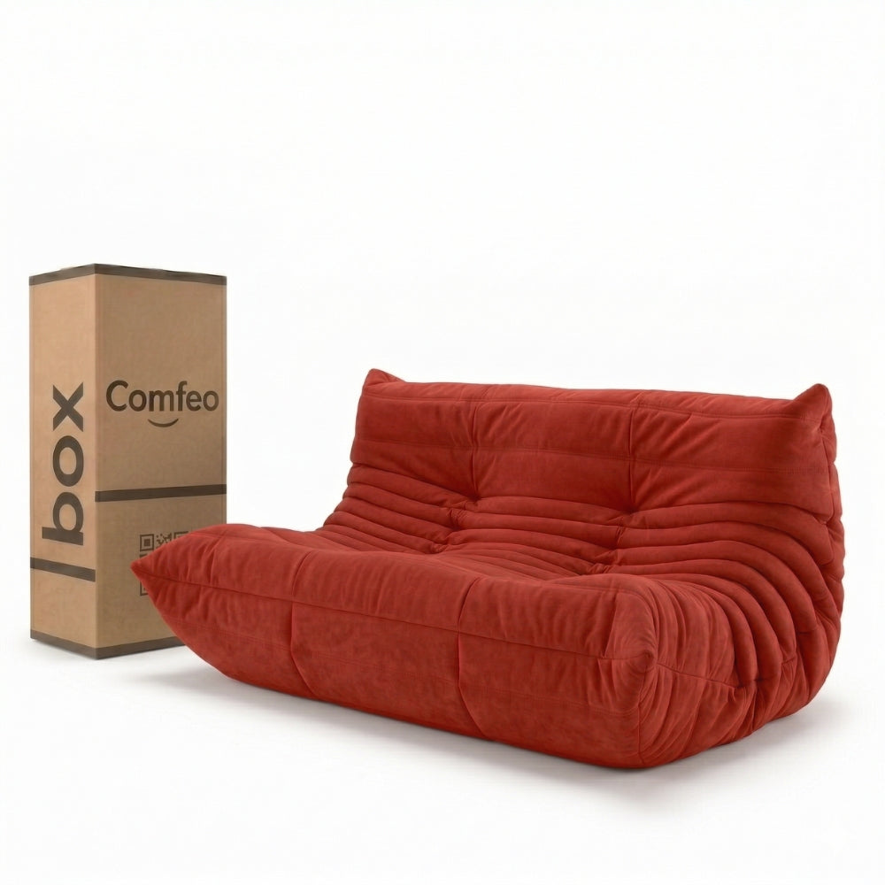 #Rouge Koto Classic canapé lounge compressé 2 places coloris rouge, vue de face : assise ferme, ligne années 70, velours matelassé, livré compressé dans un seul carton