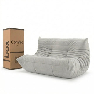 #Blanc Koto Classic canapé lounge compressé 2 places coloris blanc, vue de face : assise ferme, ligne années 70, velours matelassé, livré compressé dans un seul carton