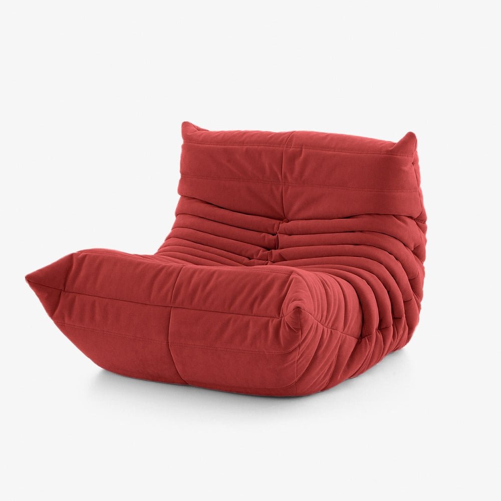 #Rouge Koto Mini chauffeuse lounge compressée 1 place coloris rouge, vue de profil : fauteuil bas au design 70s, assise ferme, velours matelassé, livré compressé