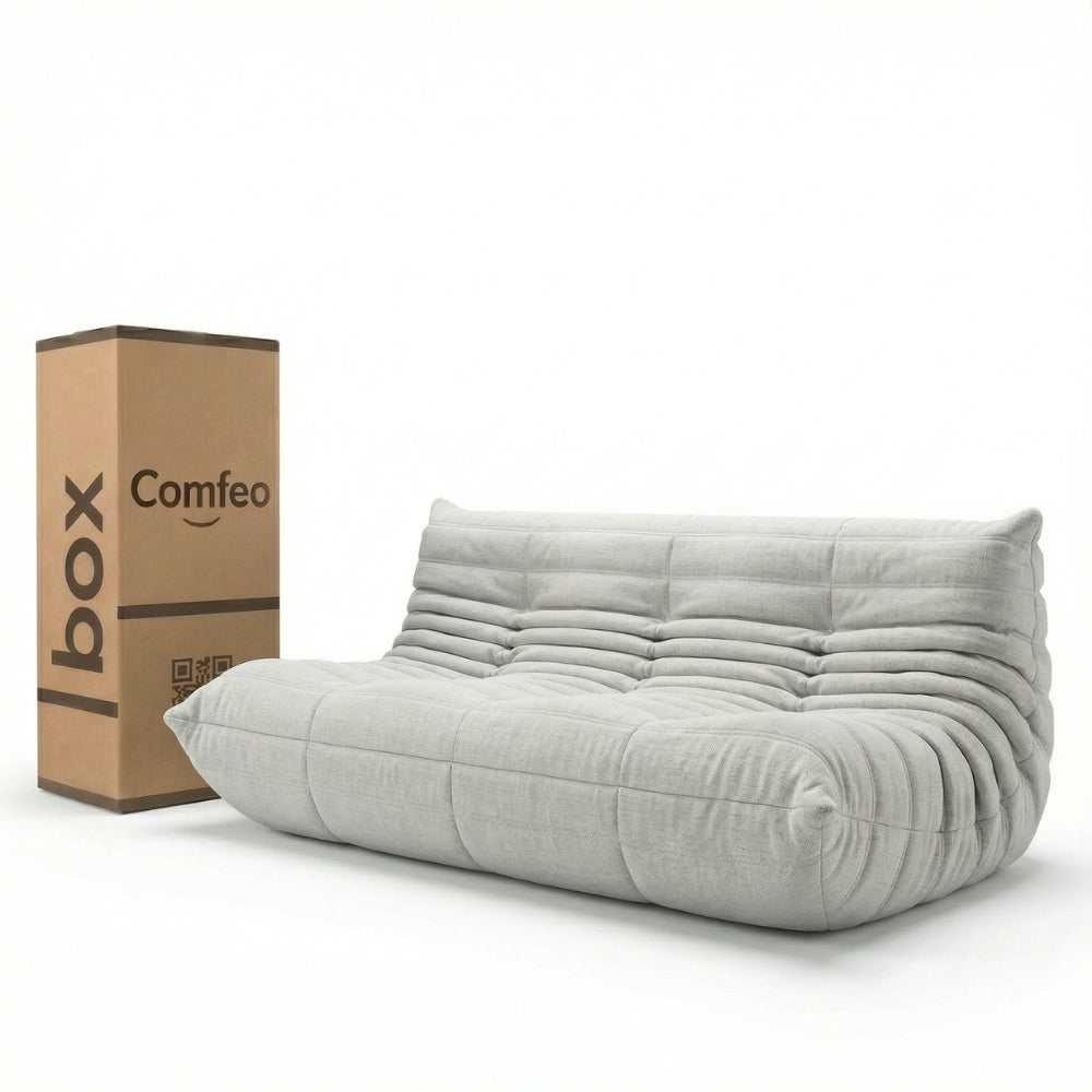 #Blanc Koto canapé lounge compressé 3 places coloris blanc, vue de face : assise ferme, silhouette années 70, velours matelassé, livré compressé dans un seul carton