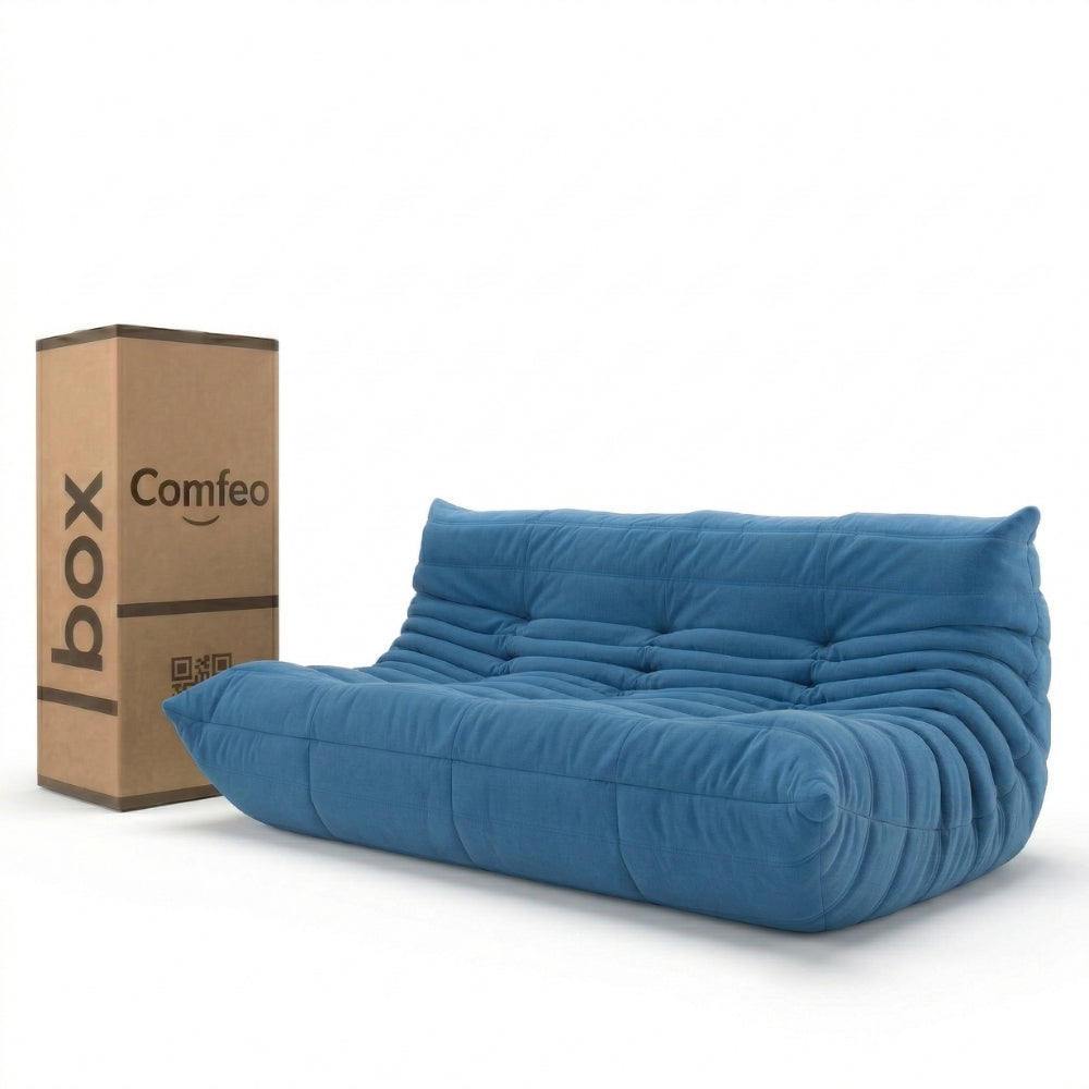 #Bleu Koto canapé lounge compressé 3 places coloris bleu, vue de face : assise ferme, silhouette années 70, velours matelassé, livré compressé dans un seul carton