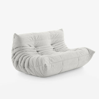 #Blanc Koto Classic canapé lounge compressé 2 places coloris blanc, vue de profil : assise ferme, ligne années 70, velours matelassé, livré compressé dans un seul carton
