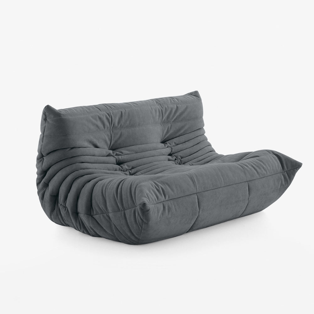 #Gris Koto Classic canapé lounge compressé 2 places coloris gris, vue de profil : assise ferme, ligne années 70, velours matelassé, livré compressé dans un seul carton