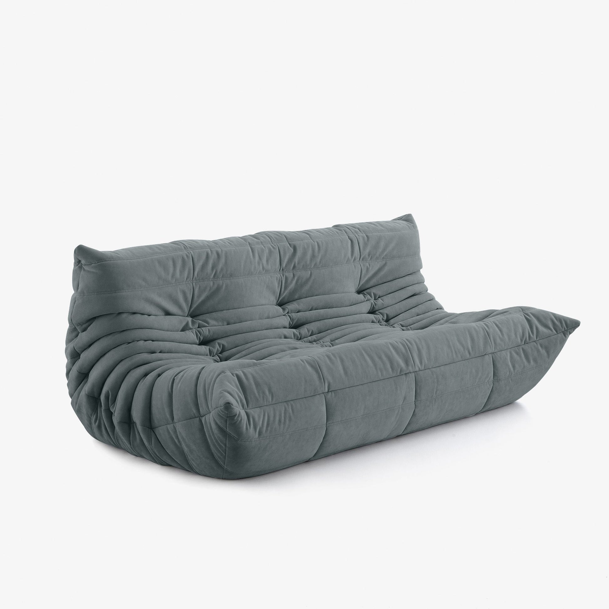 #Gris Koto canapé lounge compressé 3 places coloris gris, vue de profil : assise ferme, silhouette années 70, velours matelassé, livré compressé dans un seul carton