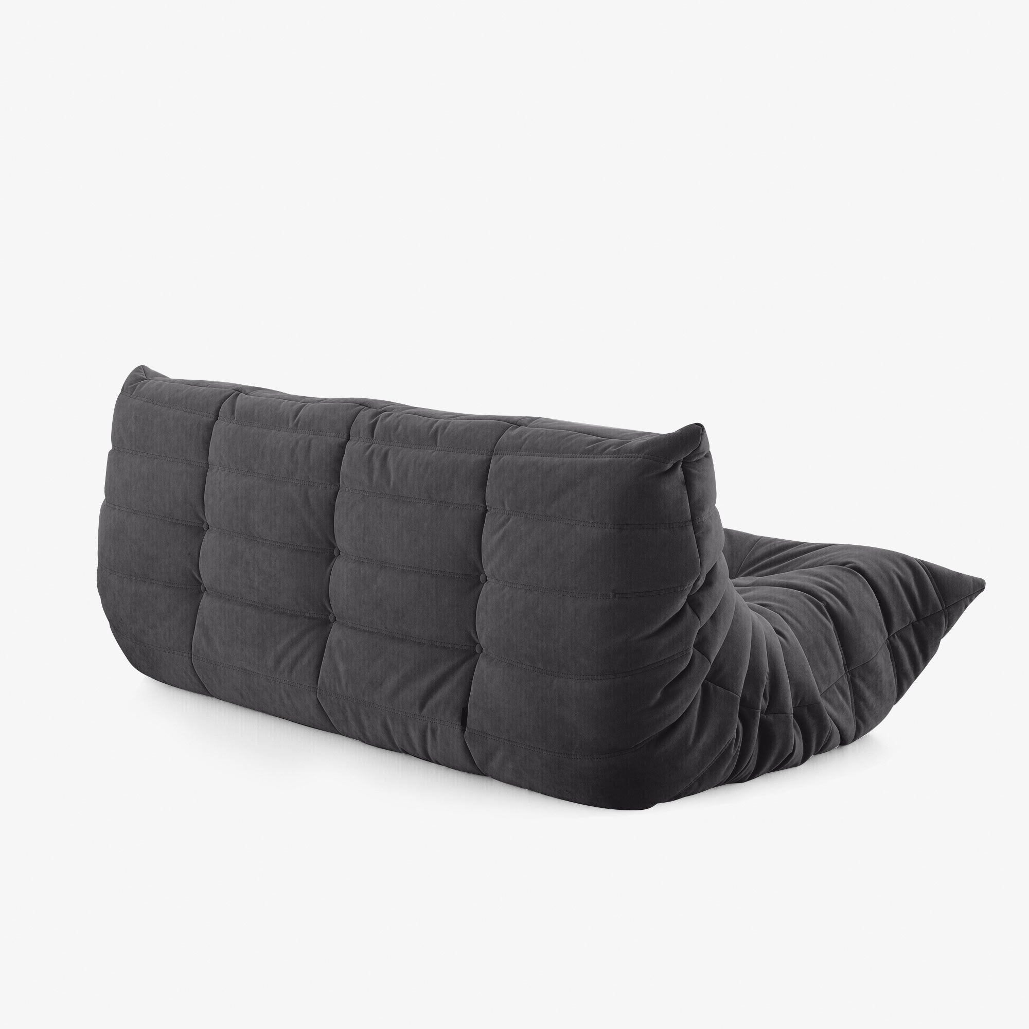 #Noir Koto canapé lounge compressé 3 places coloris noir, mise en situation dans un salon : assise ferme, silhouette années 70, velours matelassé, livré compressé dans un seul carton