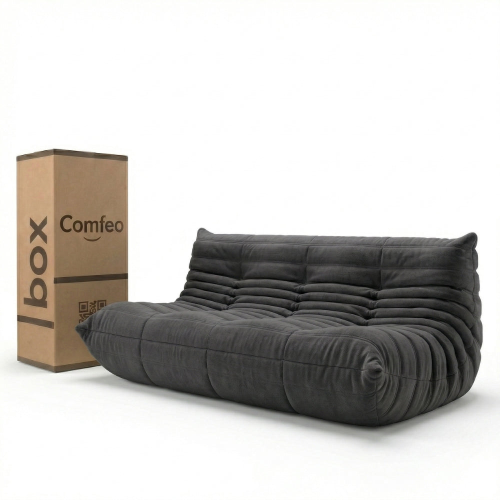 #Noir Koto canapé lounge compressé 3 places coloris noir, vue de face : assise ferme, silhouette années 70, velours matelassé, livré compressé dans un seul carton