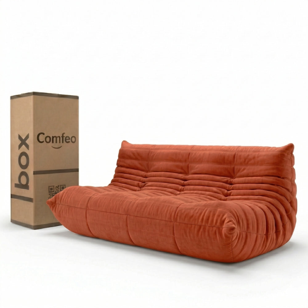 #Orange Koto canapé lounge compressé 3 places coloris orange, vue de face : assise ferme, silhouette années 70, velours matelassé, livré compressé dans un seul carton