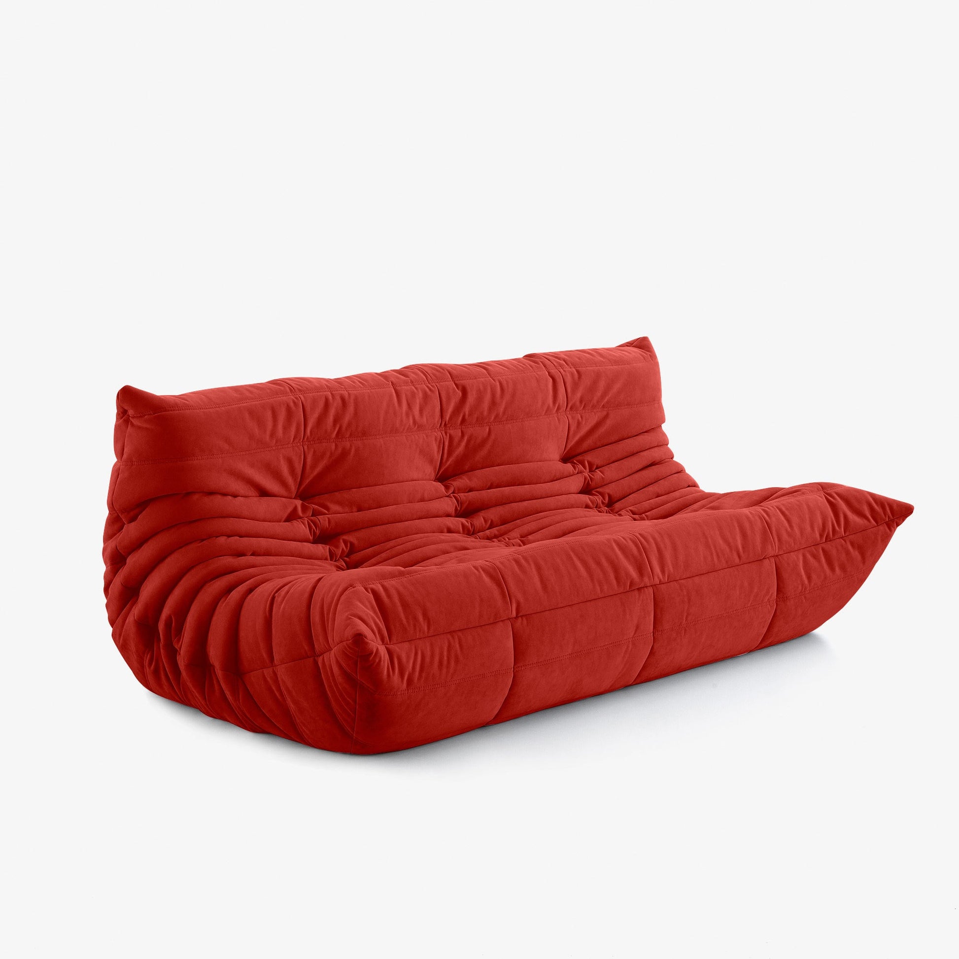 #Rouge Koto canapé lounge compressé 3 places coloris rouge, vue de profil : assise ferme, silhouette années 70, velours matelassé, livré compressé dans un seul carton