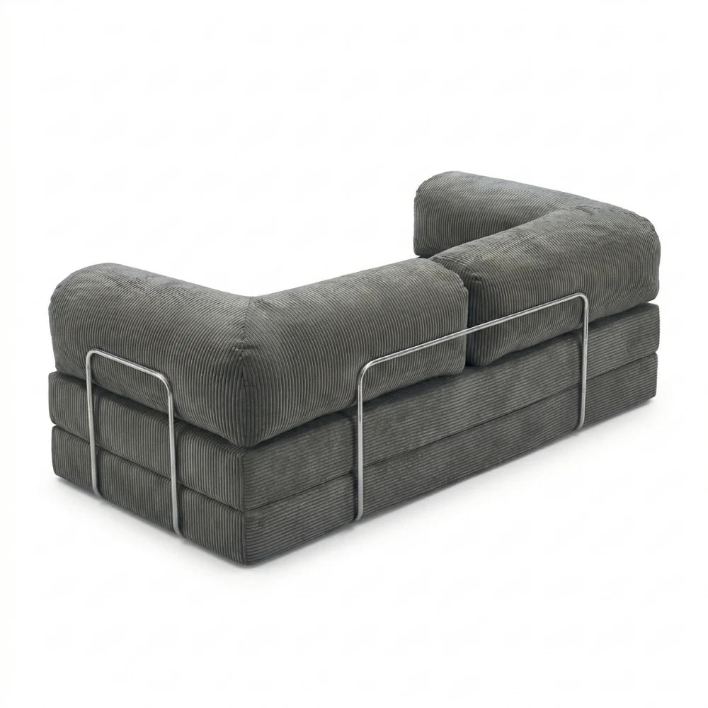 #Grisfoncé Canapé lit Nubo gris foncé, vue trois quarts montrant l'armature chromée latérale et les trois couches de mousse